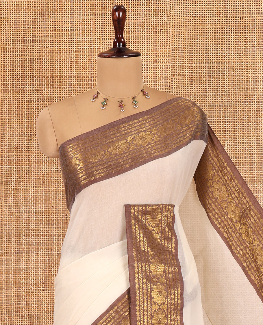 Cream Plain Khadi Mul Cotton Saree, Complemented by a Contrast Rudraksham-Floral Border, a Self-Pallu, and No Blouse