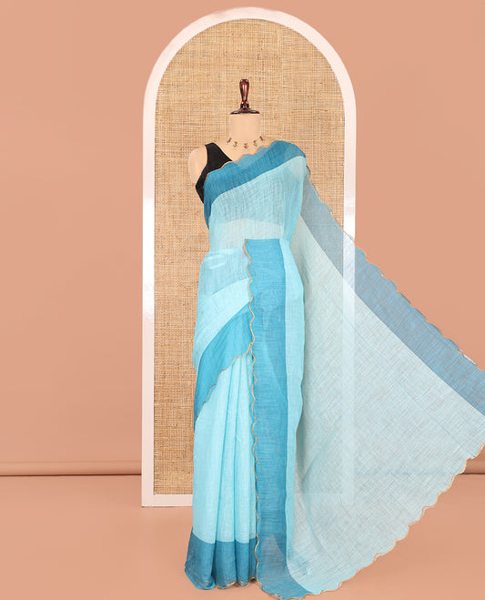 Sea Green Plain Linen Cotton Saree, Contrast Plain Scallop Border, a Self-Pallu, and Contrast Kalamkari Printed Blouse