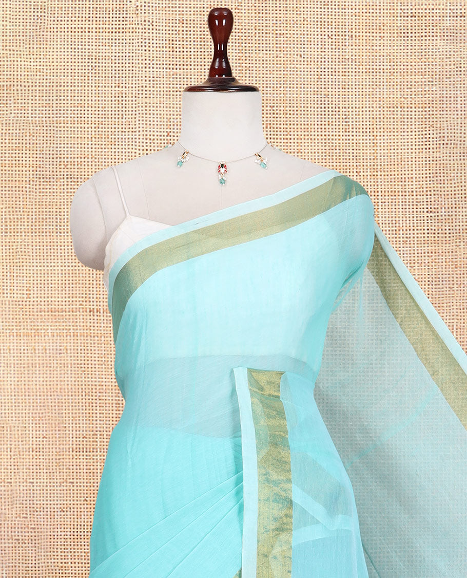 Sea Green Plain Khadi Mul Cotton Saree, a Gold Zari Border, Sequins Striped Pallu, and a Matching Blouse
