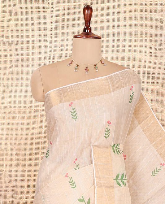 Cream-Pink Tissue Linen Cotton Saree Features Floral Buttas, a Zari Border, Floral Pallu, Matching Blouse