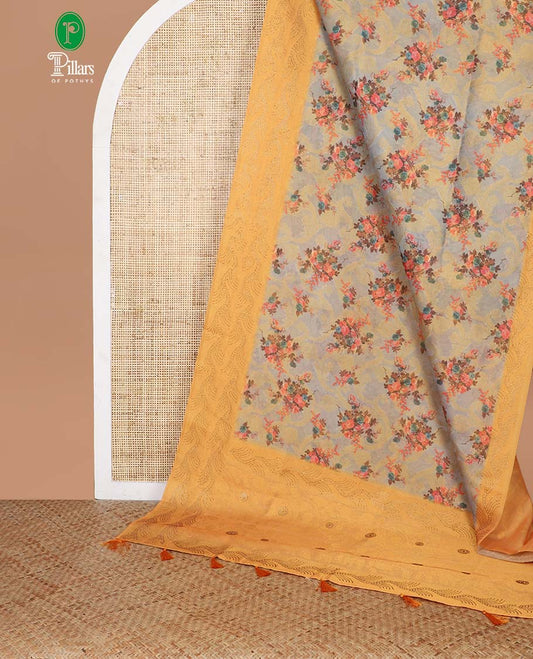 Yellow with grey zari weaving with digital printed, swarovski stone work mulberry tissue saree, jacquard, swarovski stone work border & rich weaving pallu along with butta design blouse
