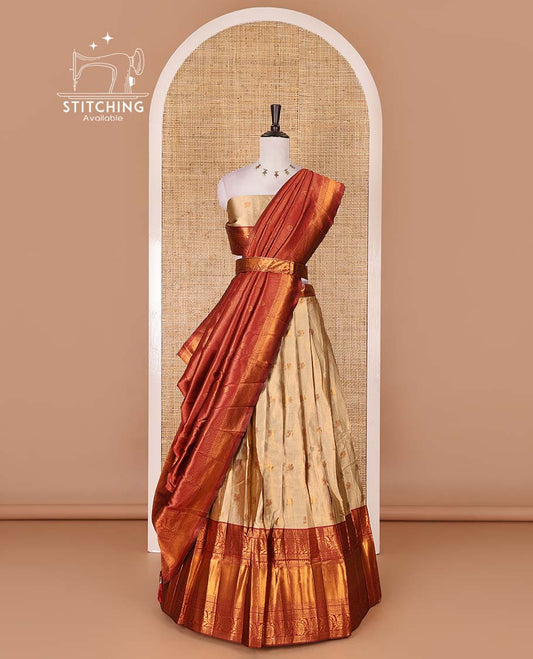 Gold banaras half saree, zari buttas with contrast maroon traditional zari border skirt, matching blouse, dhavaniof zari checks, and buttas