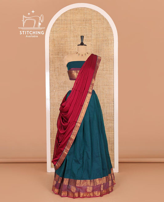 Peacock-magenta sungudi cotton half-saree, plain with contrast traditional zari peacock motif bordered skirt, matching blouse, and a zari bordered dhavani