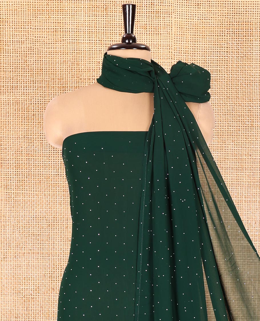 Green Fox Georgette Material Chudidar Set, Gleamed up with Stone Floral Embroidery On Its Top, A Plain Santoon Bottom and Paired with a Matching Stone Work Fox Georgette Dupatta