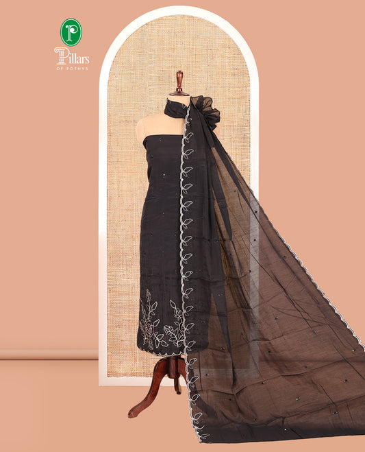 Black Mul Chanderi Material Churidar Features a Floral Outline Embroidered Top, a Santoon Bottom, a Scallop Threadwork Dupatta