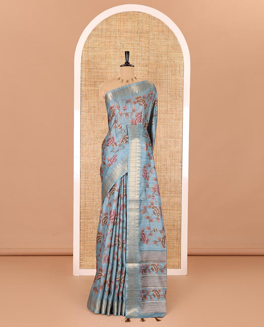 Blue floral vine printed fancy tussar saree, zari temple border, floral printed pallu, and a matching zari woven blouse