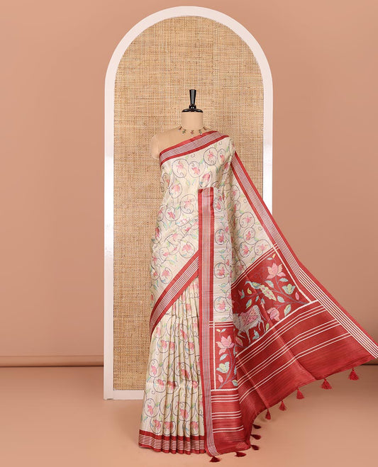 Chikku-red floral vine printed tissue patola saree, contrast striped border, pallu of floral and Pichwai cow motifs print, and a plain blouse