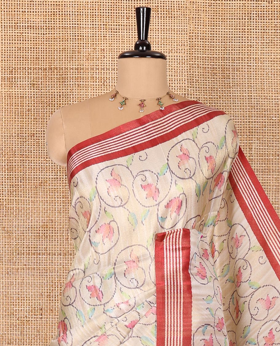 Chikku-red floral vine printed tissue patola saree, contrast striped border, pallu of floral and Pichwai cow motifs print, and a plain blouse