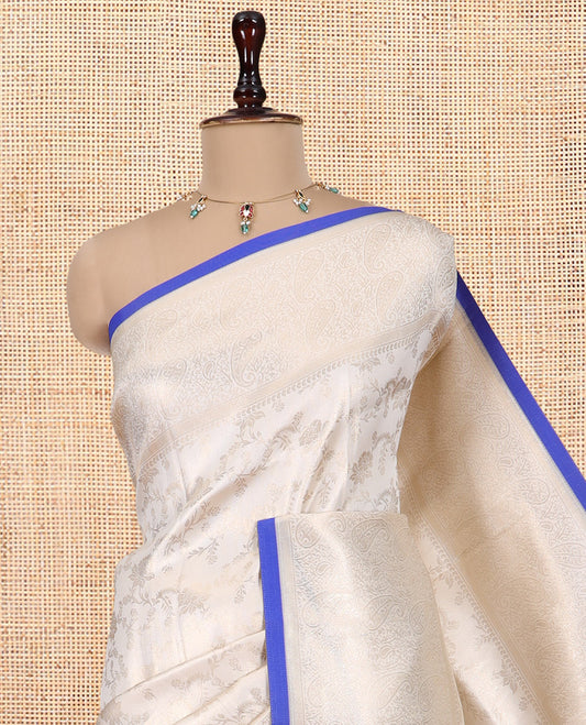 Off-White-M.s Blue Semi-Silk Saree, Adorned with Floral Jacquard Design, a Zari Paisley Border, and a Contrast Blouse