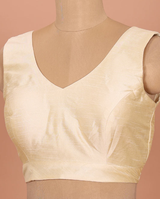 Cream plain front-back V-neck sleeveless readymade blouse