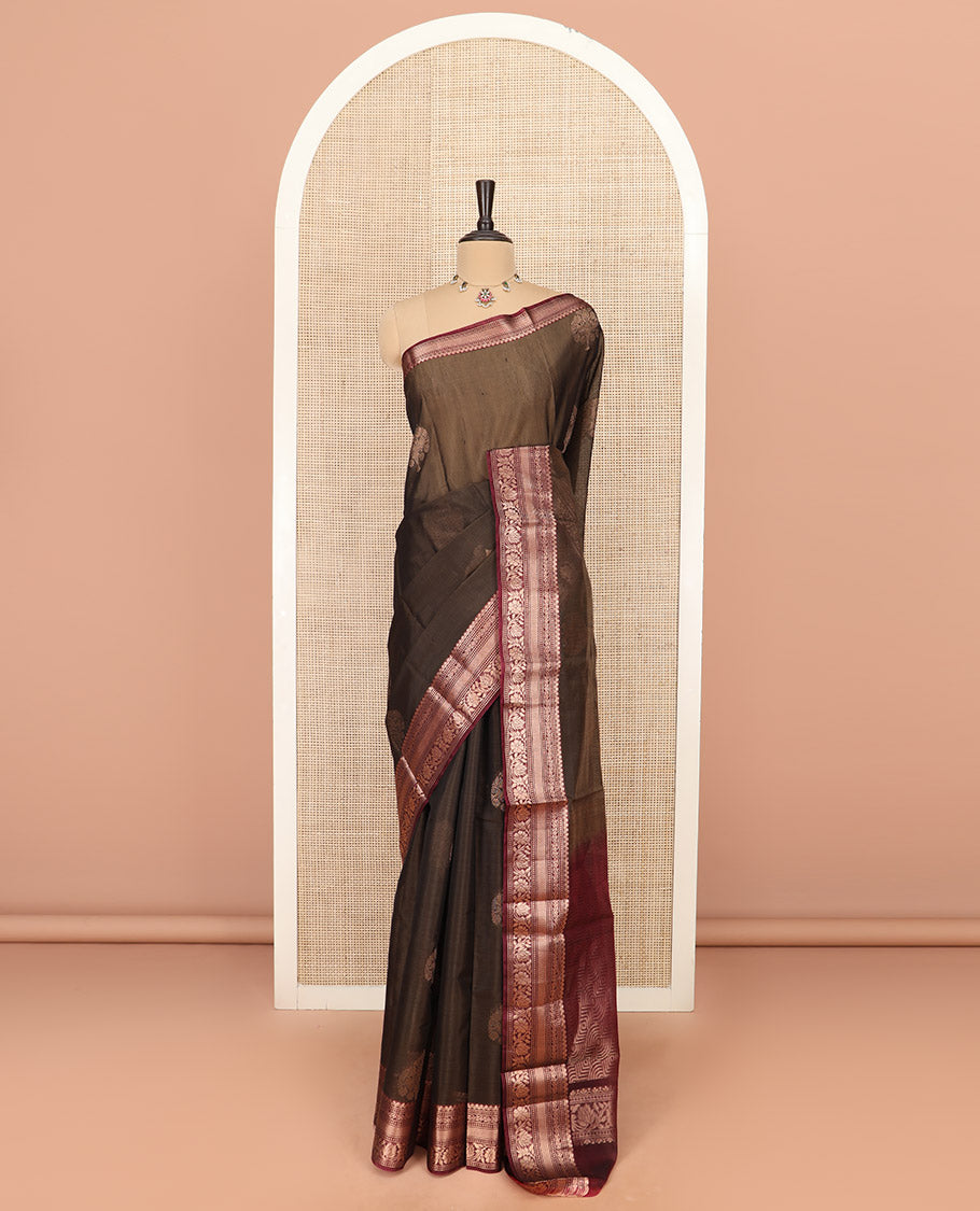 Brown Silk Cotton Saree Elevated with Zari Buttas All Over the Body, Highlighted with Contrast Traditional Zari Design Border, Pallu Featuring Geometric Designs, and Paired with a Contrast Blouse