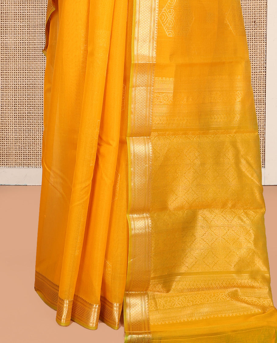 Yellow Silk Cotton Saree, Sparsely Woven with Geometric Buttas All Over Its Body, Highlighted by Traditional Zari Designs Woven Border, Grand Jaal Pallu and Paired with a Matching Blouse