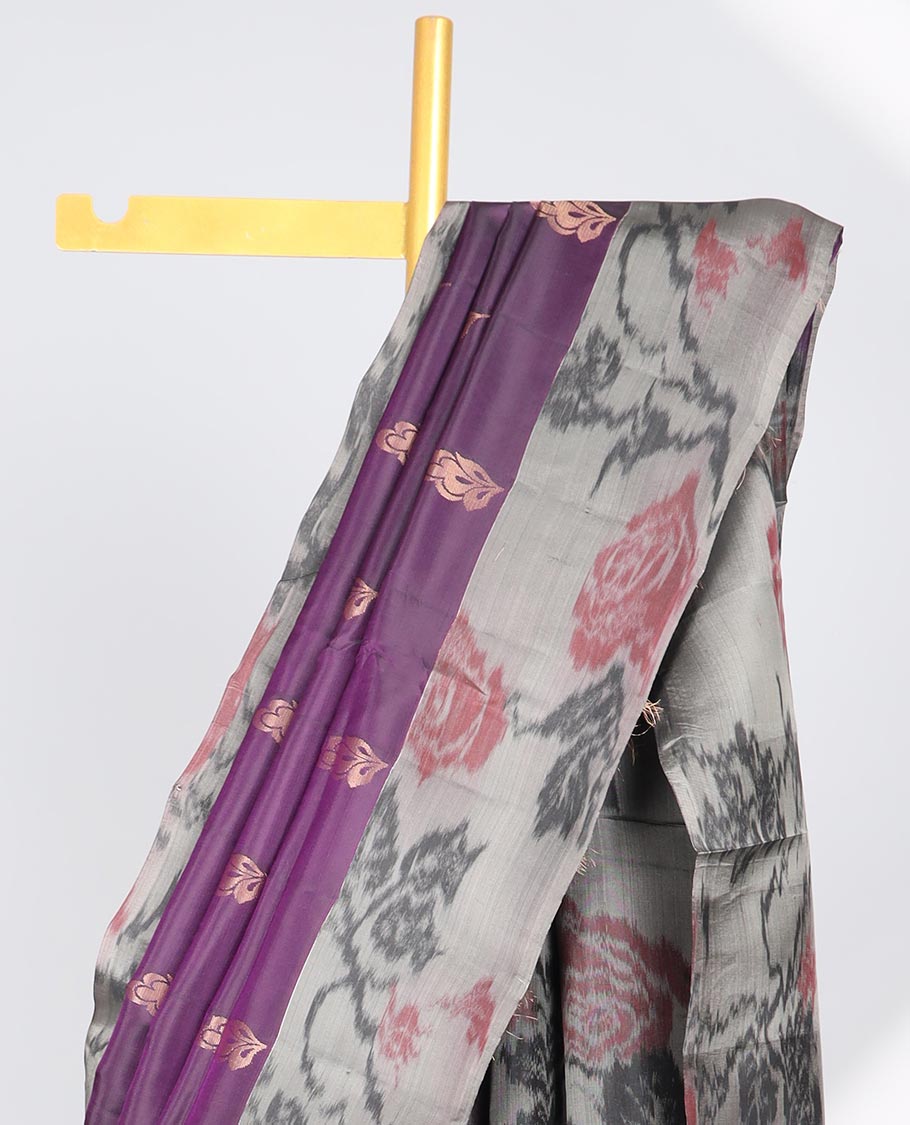 Purple floral motifs semi-soft silk saree with contrast border & floral vine design pallu