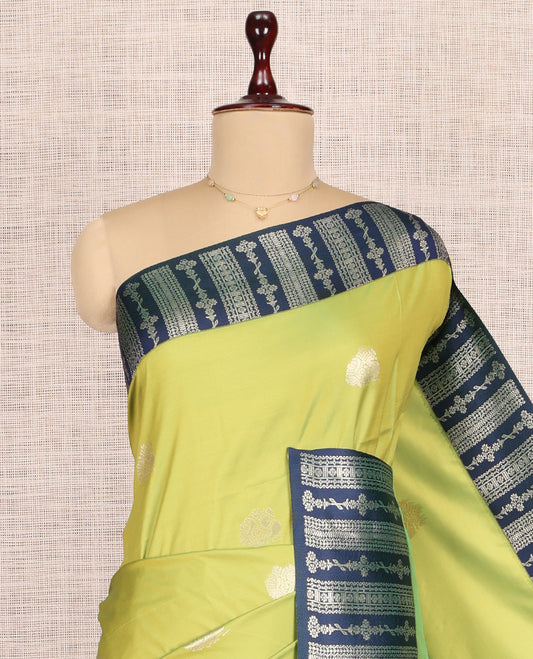 Green Fancy Soft Silk Saree, Decorated with Zari Buttas, Complemented by Contrast Floral Creeper Zari Border, Grand Pallu, and a Contrast Blouse