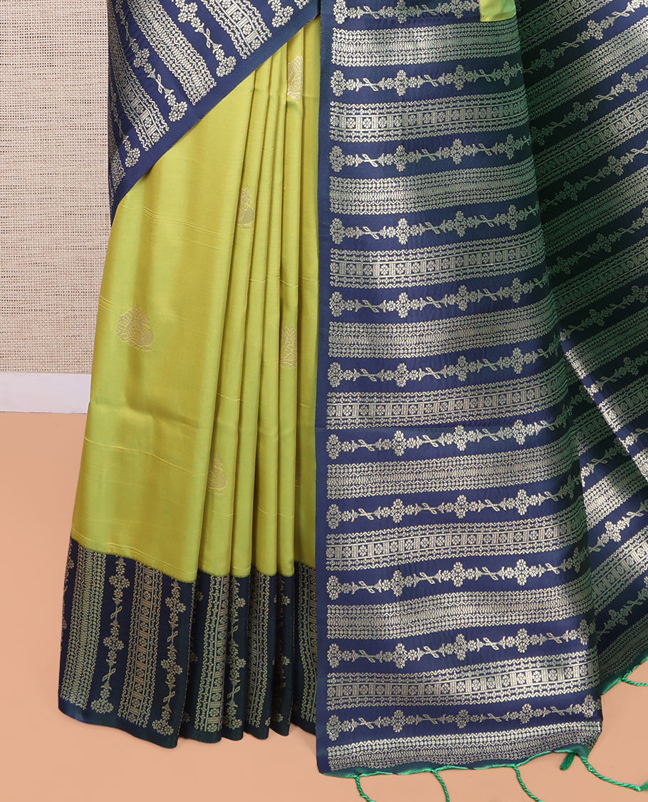 Green Fancy Soft Silk Saree, Decorated with Zari Buttas, Complemented by Contrast Floral Creeper Zari Border, Grand Pallu, and a Contrast Blouse