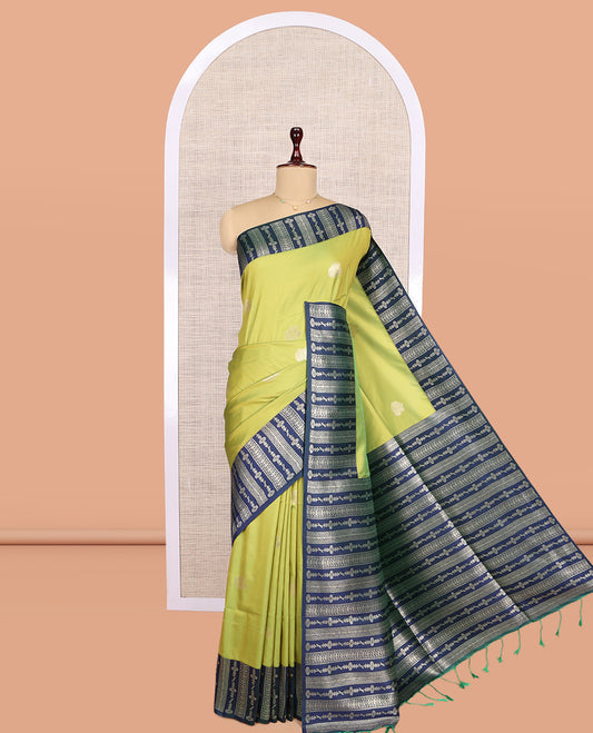 Green Fancy Soft Silk Saree, Decorated with Zari Buttas, Complemented by Contrast Floral Creeper Zari Border, Grand Pallu, and a Contrast Blouse