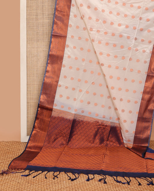 Cream semi-soft silk saree with zari buttas, contrast traditional motifs zari border & pallu of jaal design