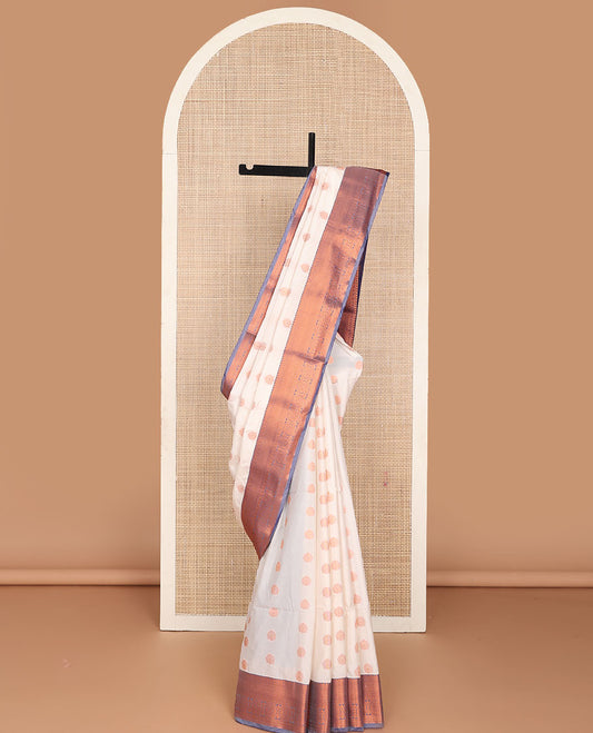 Cream semi-soft silk saree with zari buttas, contrast traditional motifs zari border & pallu of jaal design