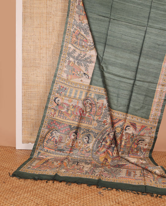 Green plain design tussar saree, contrast border & pallu features Madhubani-style human figurine print