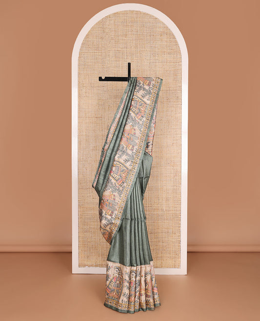 Green plain design tussar saree, contrast border & pallu features Madhubani-style human figurine print