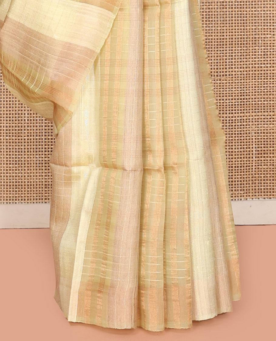 Borderless Yellow Tussar Silk Saree, Enthralled with Checked Design on Its Body, a Self-Heathered Pallu, and Paired with a Matching Blouse