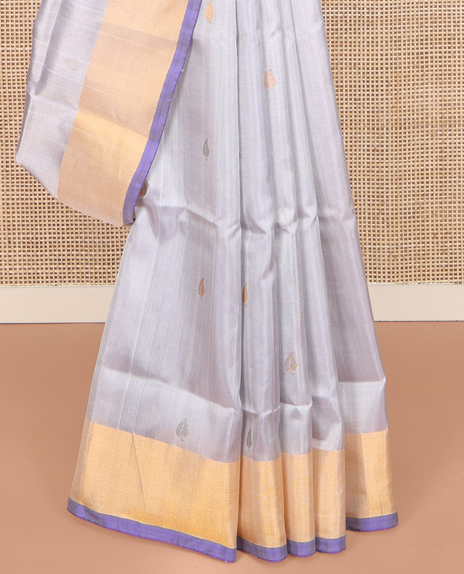 Grey Uppada Silk Saree, Sparsely Woven with Buttas All Over Its Body, Subtle Bavanji Border, Complemented by Contrast Pallu of Butta Enclosed Jaal Designs, and Paired with a Contrast Blouse