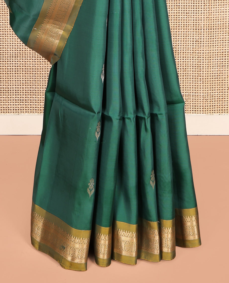 Green Uppada Silk Saree, Highlighted with Zari Buttas, a Contrast Traditional Zari Border, Contrast Intricate Pallu, and a Contrast Blouse