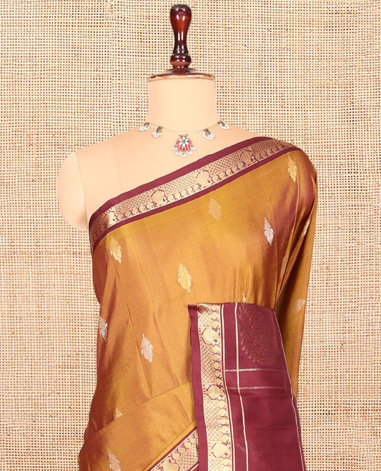Mustard Uppada Silk Saree, Finely Crafted with Buttas, Complemented by a Contrast Traditional Zari Design Border, Floral-Paisley Pallu, and a Contrast Blouse