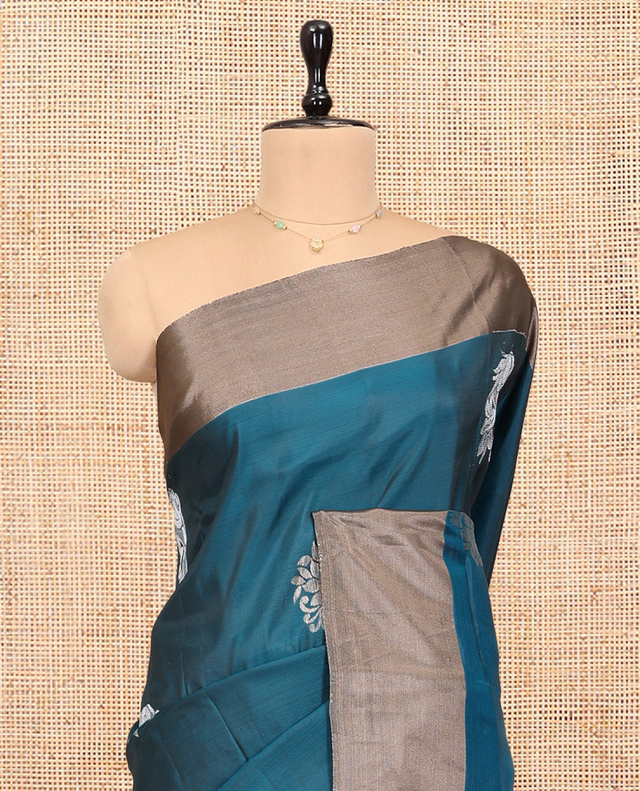 Peacock Blue Semi Uppada Saree, Features Zari Buttas, a Bavanji Border, Contrast Floral Pallu, and a Contrast Blouse