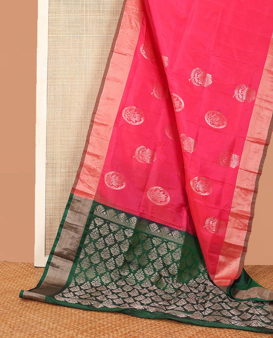 Pink zari buttas Uppada saree, contrast bavanji border, and intricately designed pallu
