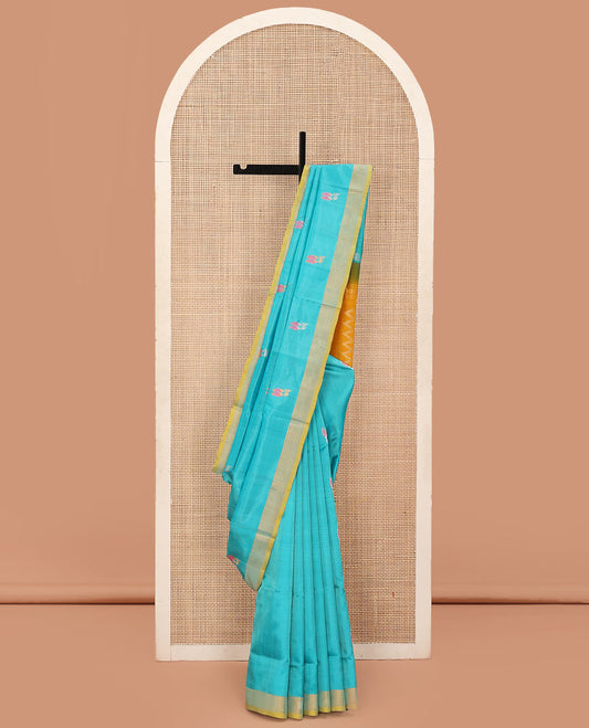 Sky Blue Uppada Silk Saree Elegantly Framed with Meena Floral Buttas, Complemented by a Contrast Bavanji  Border, Pallu Steeped with Floral-Paisley Designs, and Paired with a Contrast Blouse