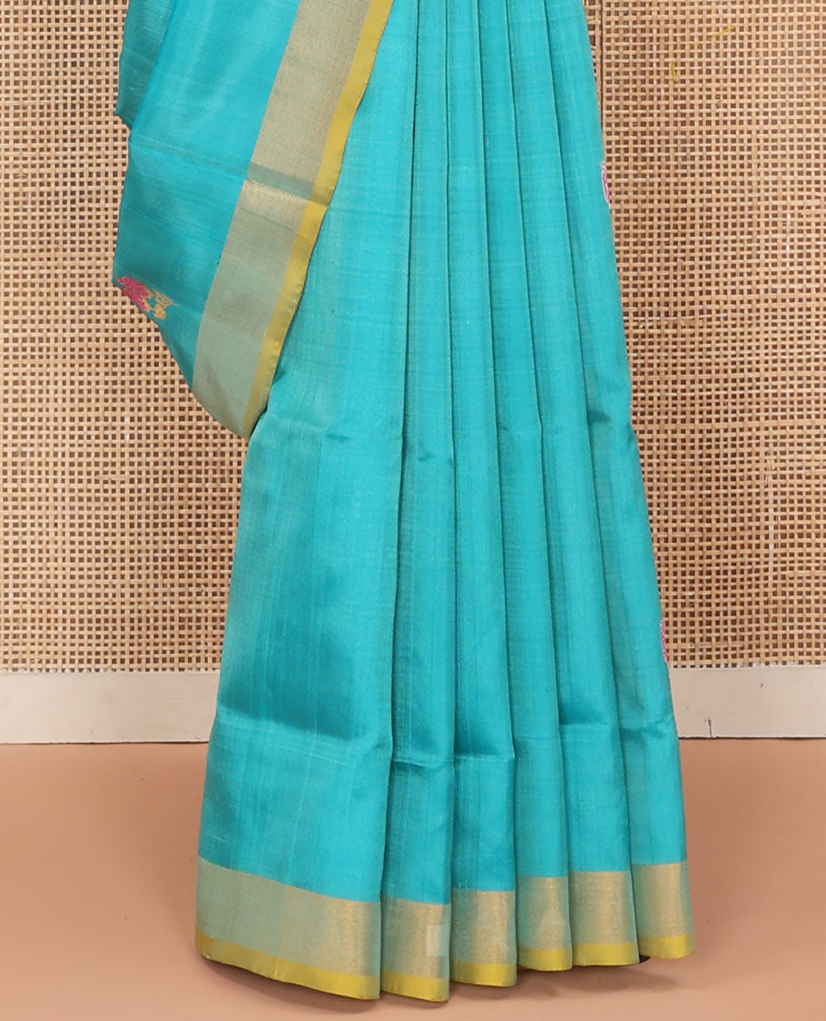 Sky Blue Uppada Silk Saree Elegantly Framed with Meena Floral Buttas, Complemented by a Contrast Bavanji  Border, Pallu Steeped with Floral-Paisley Designs, and Paired with a Contrast Blouse