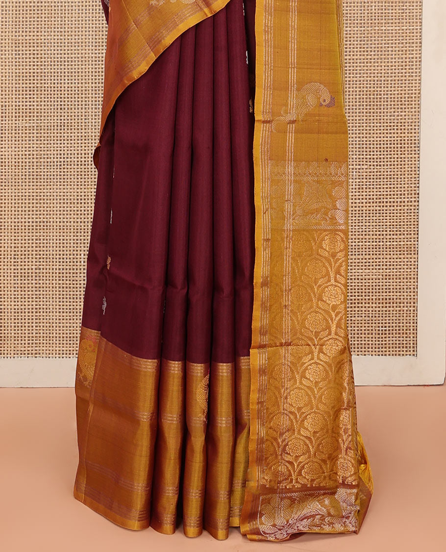 Maroon Uppada Silk Saree Ornamented with Zari Buttas, Complemented by a Contrast Zari Border of Bird Designs, Contrast Pallu of Scallop Designs, and Paired with a Contrast Blouse