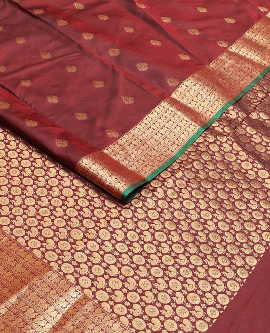 Maroon zari buttas Vasundhara silk mix saree, zari border of rekku & mayil designs & pallu steeped with mayil chakram designs
