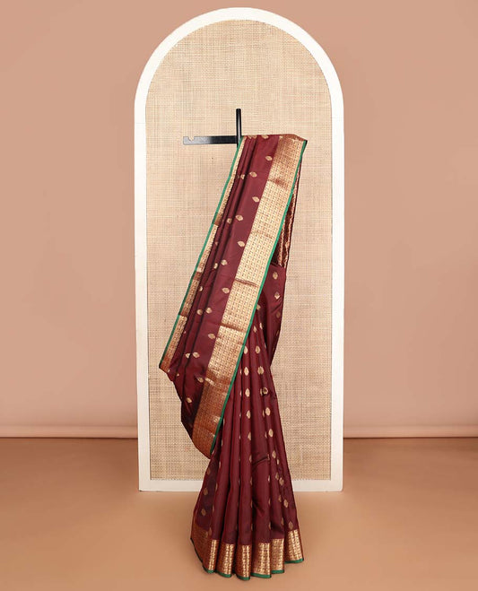 Maroon zari buttas Vasundhara silk mix saree, zari border of rekku & mayil designs & pallu steeped with mayil chakram designs