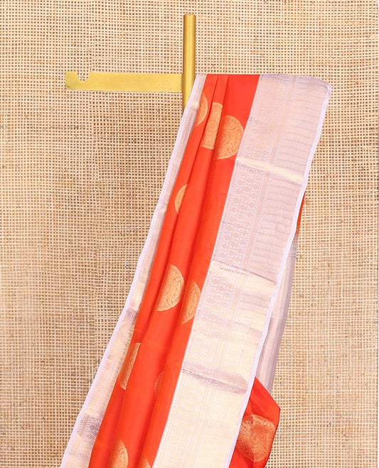 Orange Vasundhara Lite-Silk Mix Saree, Embellished with Chakram Zari Buttas All Over Its Body, Complemented by a Contrast Border of Rekku, Rudraksham, Neli, and Kathir Designs, Artfully Decked Up Pallu of Kathir Designs, and Paired with a Contrast Blouse