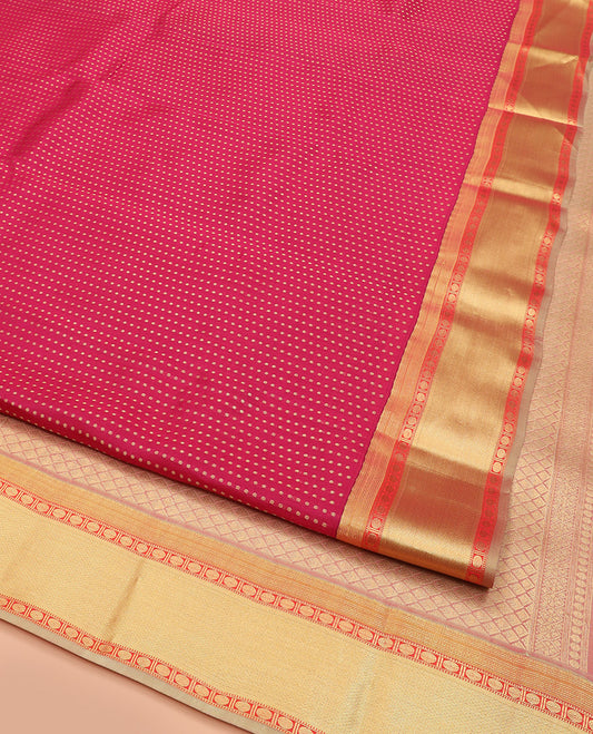 Red Vasundhara Lite Silk Mix Saree, Richly Detailed with Zari Buttas All Over Its Body, Complemented by Contrast Border of Rudraksham, Muthu, and Mayil Kann Designs, Grandly Woven Pallu of Jaal Designs, and Paired with a Contrast Blouse