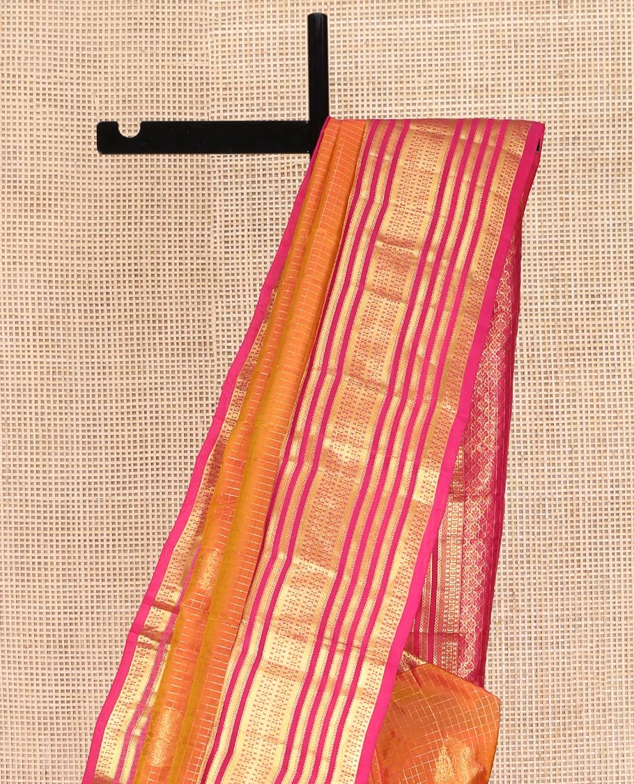 Orange Vasundhara Lite Silk Mix Saree, Elegantly Highlighted with Zari Buttas and Checks on Its Body, Complemented by a Contrast Border of Poun and Banaras Designs, Grand Jaal Pallu, and Paired with a Contrast Blouse