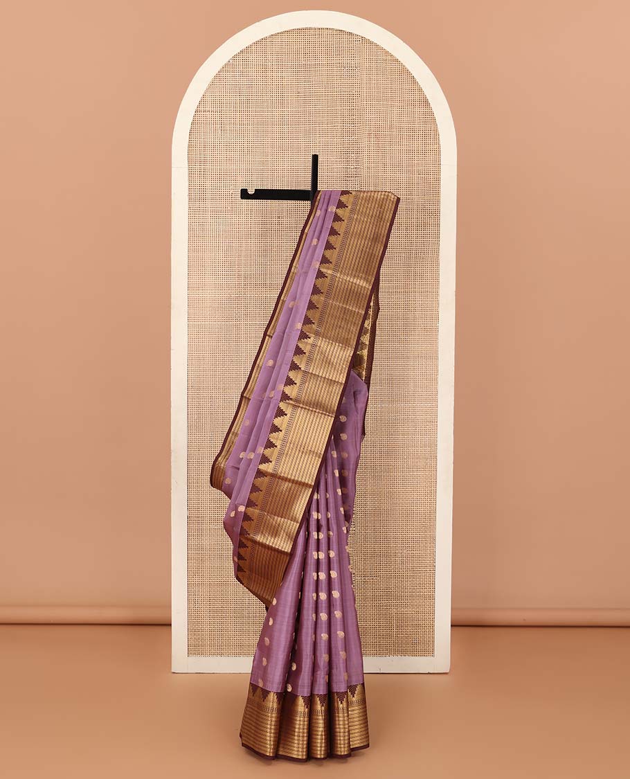Purple manga buttas Vasundhara silk mix saree, contrast thazampoo rekku border of geometric designs, and geometric patterned pallu