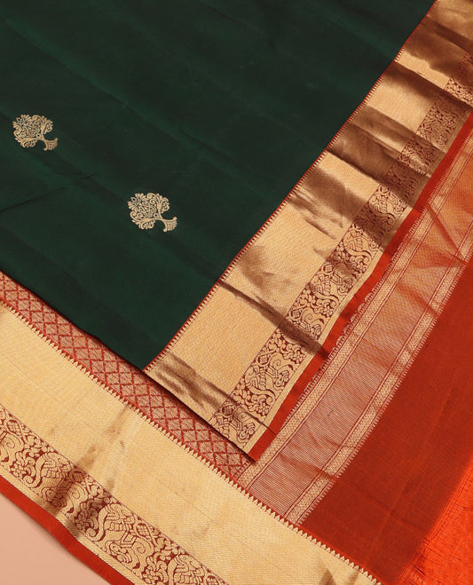 Green Vasundhara Lite Silk Mix Saree Spotlighted with Zari Buttas, Featuring a Contrast Border of Thazampoo Rekku, and Yaali Designs, Zari Woven Pallu of Jaal Designs, and Paired with a Contrast Blouse
