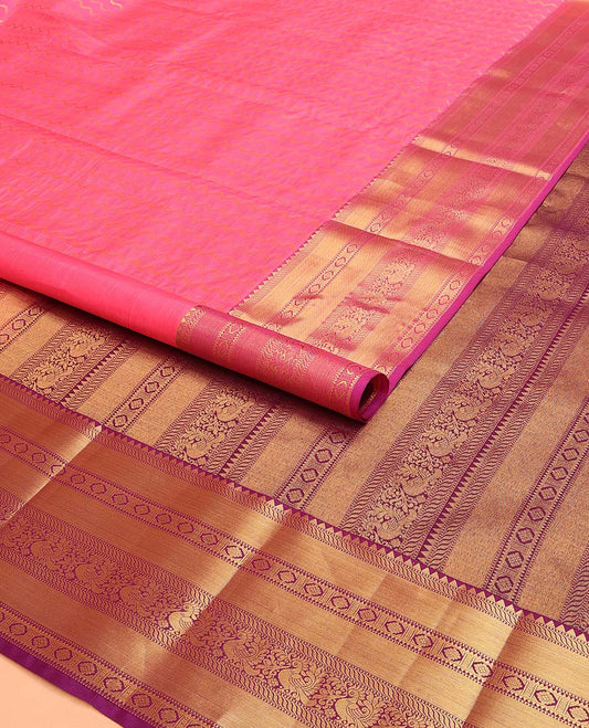 Blue Vasundhara Lite Silk Mix Saree Adorned with Zig-Zag Stripes, Complemented with a Contrast Border Featuring Rekku, Puli Nagam, Laddu Kamalam, and Mayil Designs, Pallu Adorned with the Same Border Motifs, and Paired with a Contrast Blouse