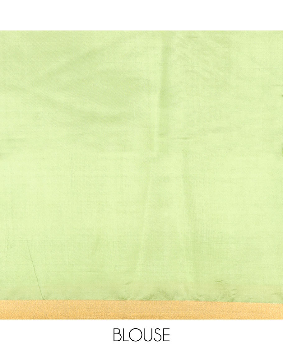Leaf green buttas banana pith saree, zari border, and zari striped pallu
