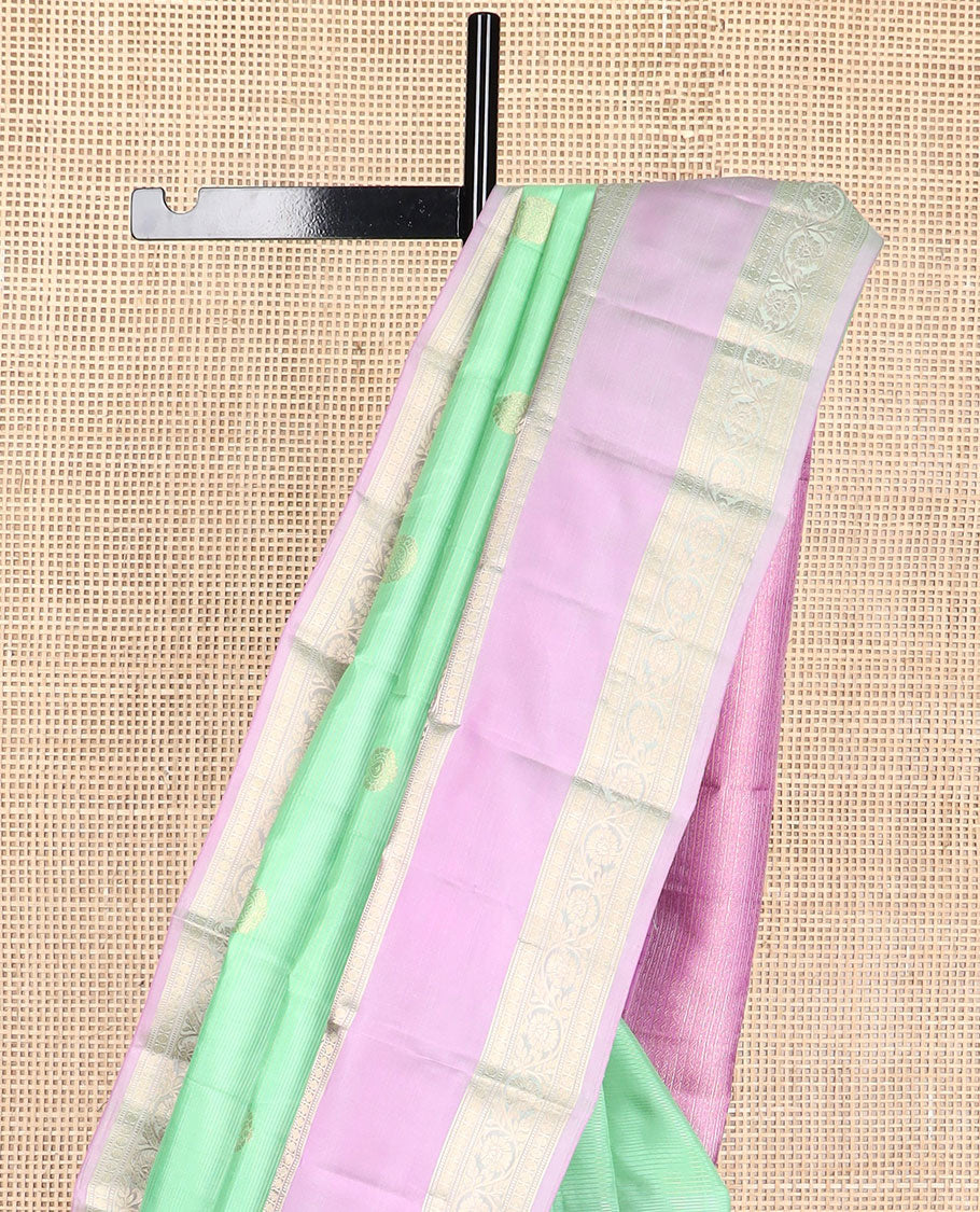Light green striped , buttas silk saree with contrast rettai pettu border of thilakam mokku, paun, muthu design & zari design pallu