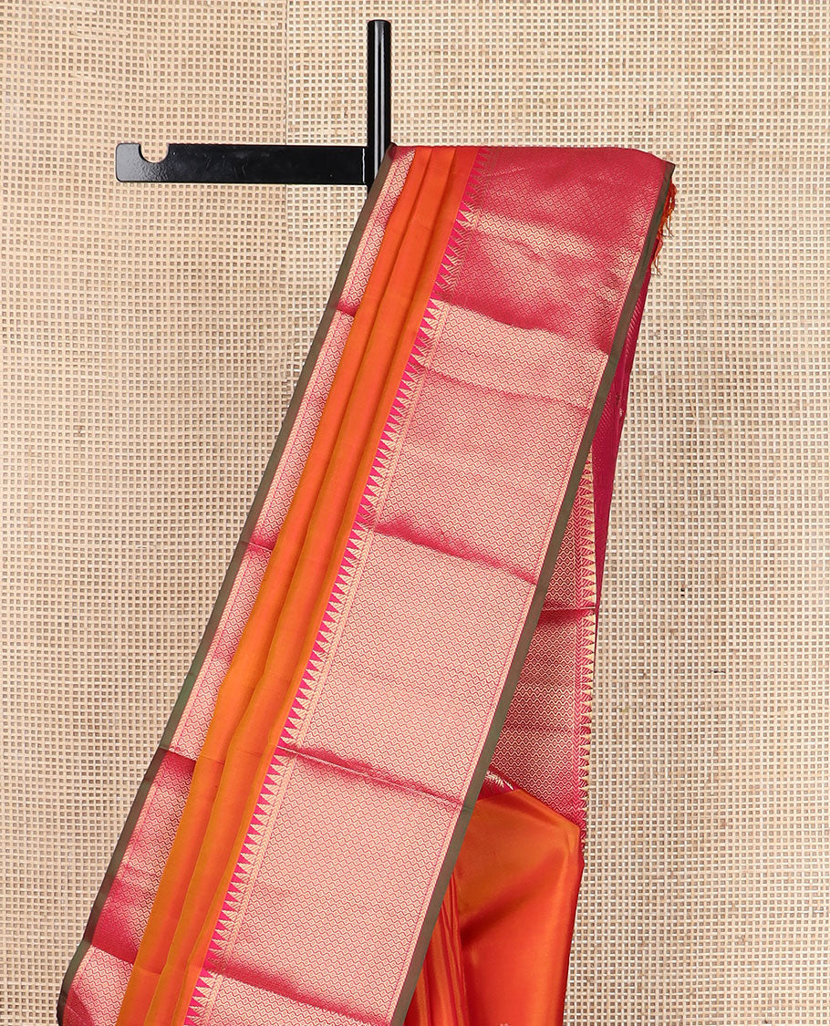 Orange zari buttas silk saree, contrast border of rekku & then kuli kann designs & pallu woven with Annam chakram & jaal design