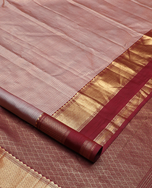 Brown micro-checked silk saree, contrast rettai pettu border of thazampoo rekku, banaras, muthu, and geometric designs, and jaal pallu