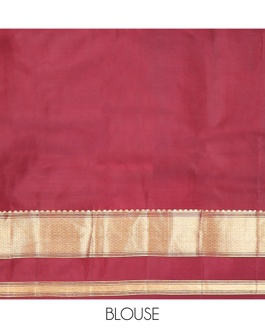 Brown micro-checked silk saree, contrast rettai pettu border of thazampoo rekku, banaras, muthu, and geometric designs, and jaal pallu