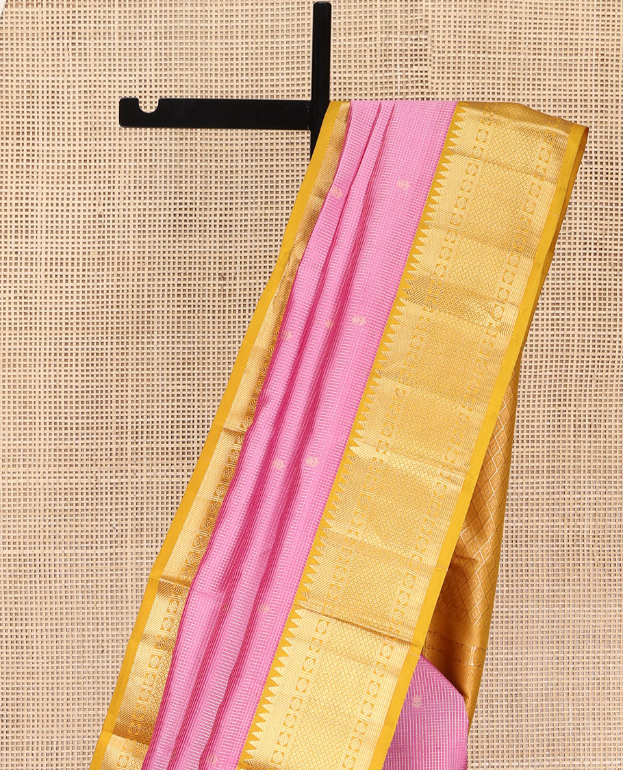 Pink Vasundhara Silk Saree, Subtly Sparkled with Zari Buttas and Checks All Over Its Body, Complemented by a Contrast Border of Rekku, Rudraksham, and Then Kuli Kann Designs, Grand Jaal Pallu, and Paired with a Contrast Blouse