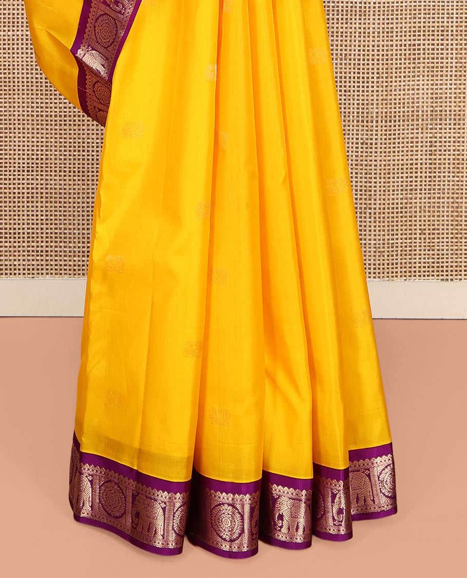 Yellow Vasundhara Silk Saree, Subtly Sparkled with Zari Buttas, Complemented by Contrast Border of Rekku, Chakram, and Yaanai Designs, Jaal Pallu, and a Contrast Blouse