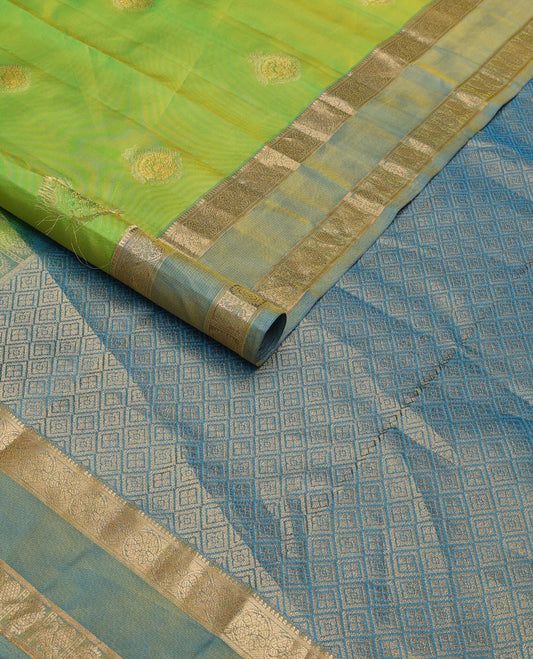 Green zari buttas silksaree, contrast rettai pettu border of rekku,kodi visiry & annam chakram & zari-rich jaal pallu
