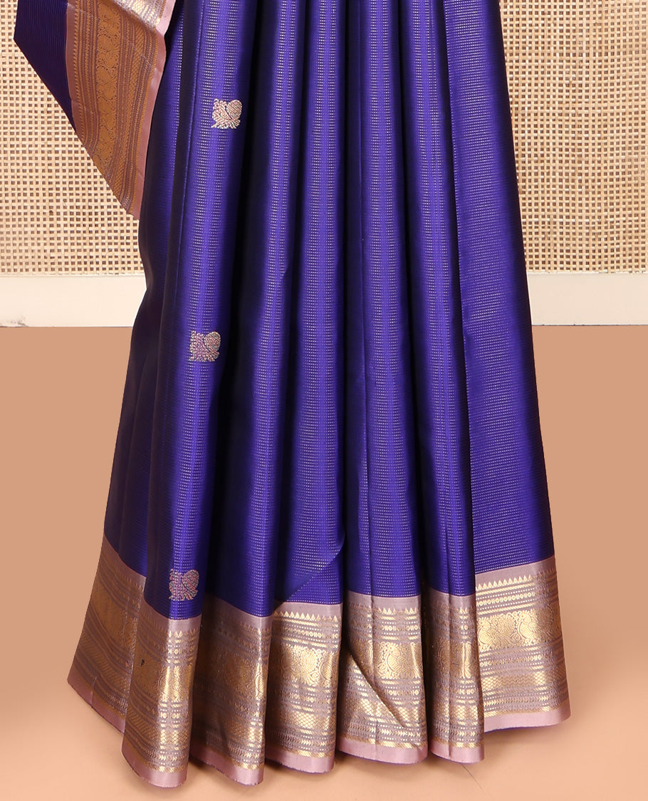 Blue Vasundhara Silk Saree, Ornamented With Vaira Oosi Stripes, Mayil and Chakram Buttas, Complemented by Contrast Border of Rekku, Mayil, Mayil Kann, and Ara Maadam Designs, Grand Pallu and Paired with a Contrast Blouse